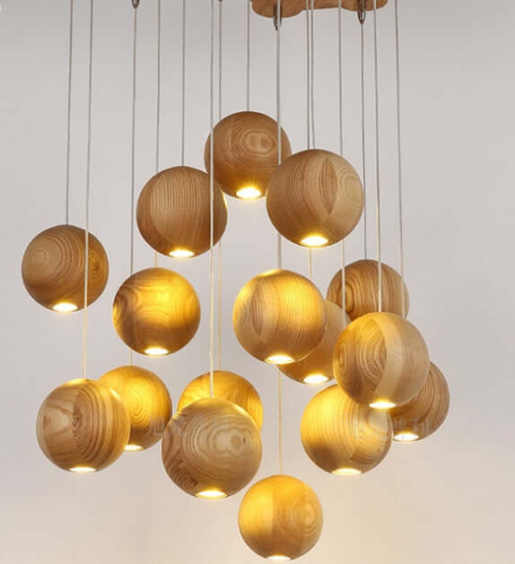 Nordic solid wood ball chandelier with warm glowing lights, ideal for living and dining rooms.