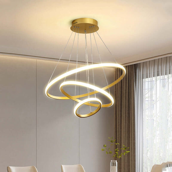 Elegant gold chandelier with luminous rings, perfect for living and dining rooms, showcasing a modern design.